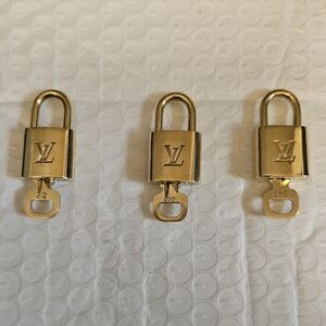Louis Vuitton Lock & Key #319 Listing for 1 item only